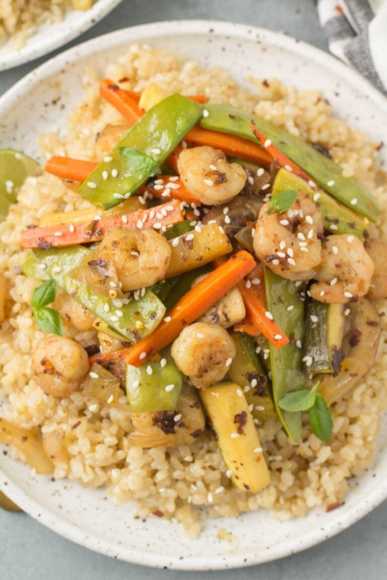 A close up of Healthy Shrimp Stir Fry on a white plate