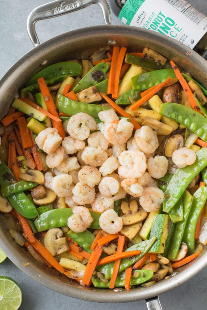 Healthy Shrimp Stir Fry in a pan with shrimp and veggies