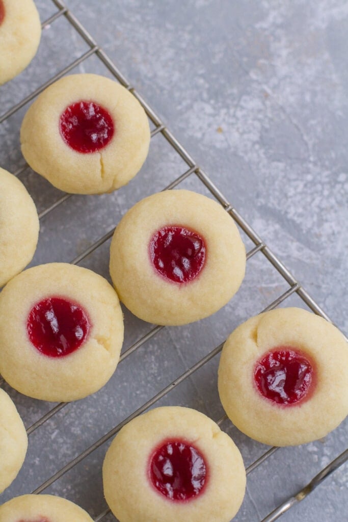 Classic Thumbprint Cookies on a cooling rack