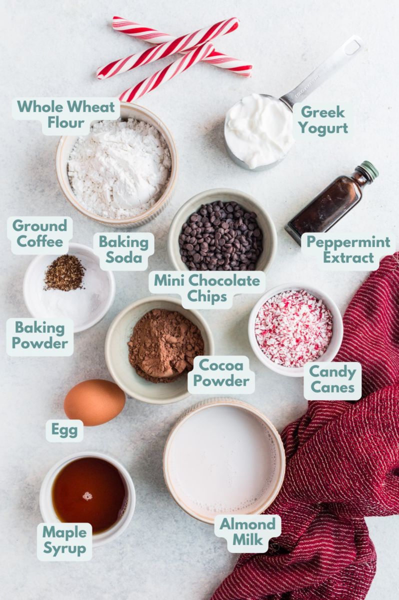Ingredients for Peppermint Mocha Muffins on a white background with a red linen