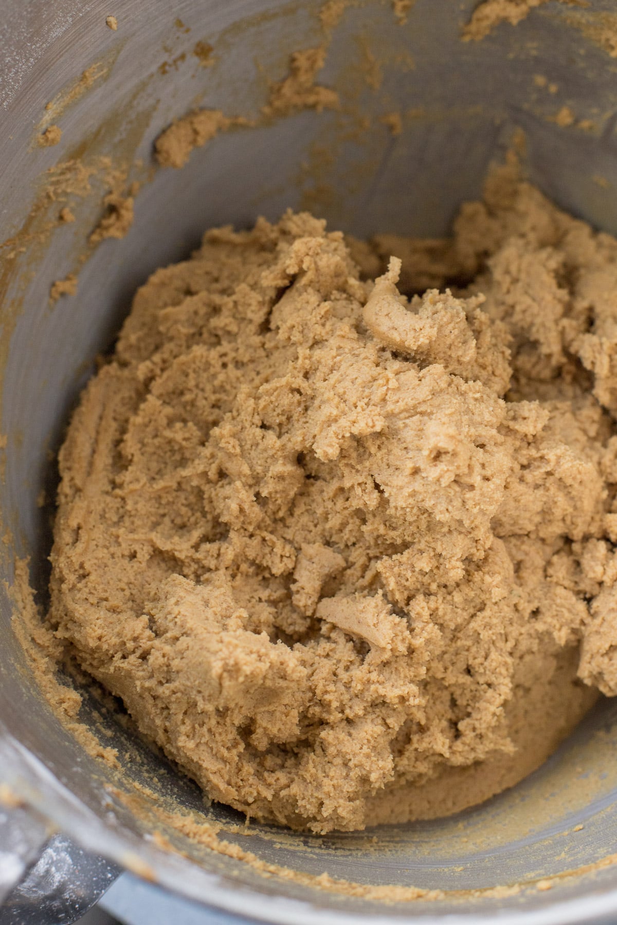 Gingersnap cookie dough in a metal bowl