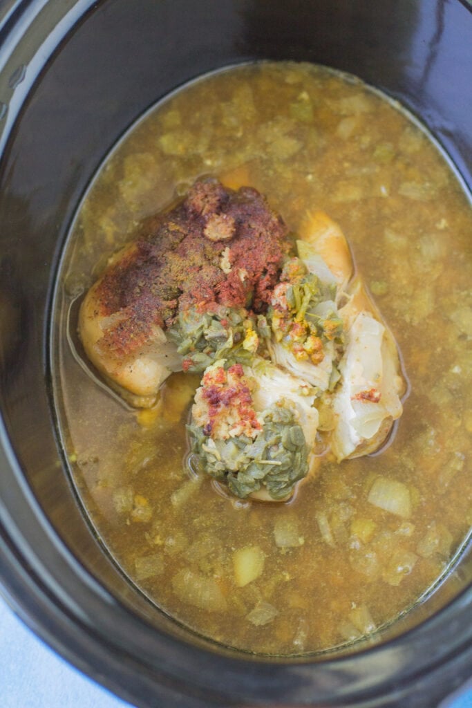 Healthy Chicken Chili in a crockpot base after being cooked