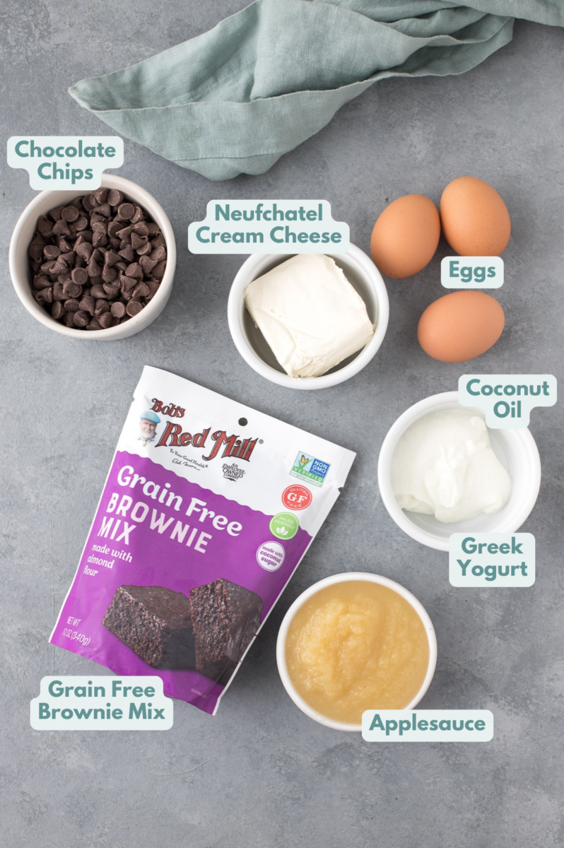 Ingredients for Healthy Brownie Truffles in small white bowls on a grey background