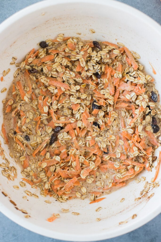 Carrot Cake Baked Oatmeal batter mixed together in a small white bowl