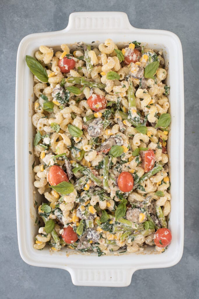 a white baking dish filled with tiktok feta pasta
