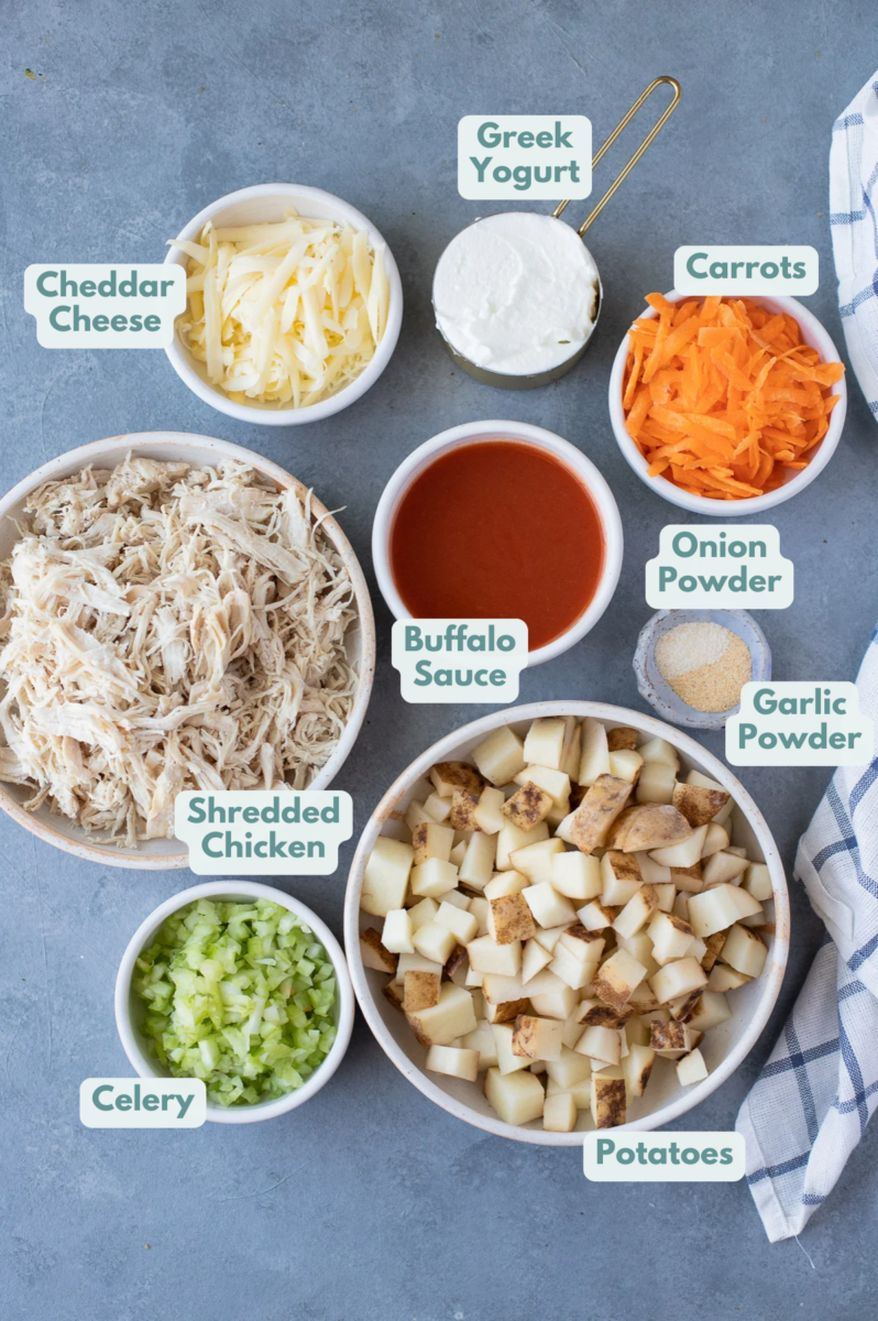 Ingredients for Buffalo Chicken Casserole: olive oil, shredded chicken, potatoes, buffalo sauce, celery, carrots, garlic powder, onion powder, greek yogurt, cheddar cheese