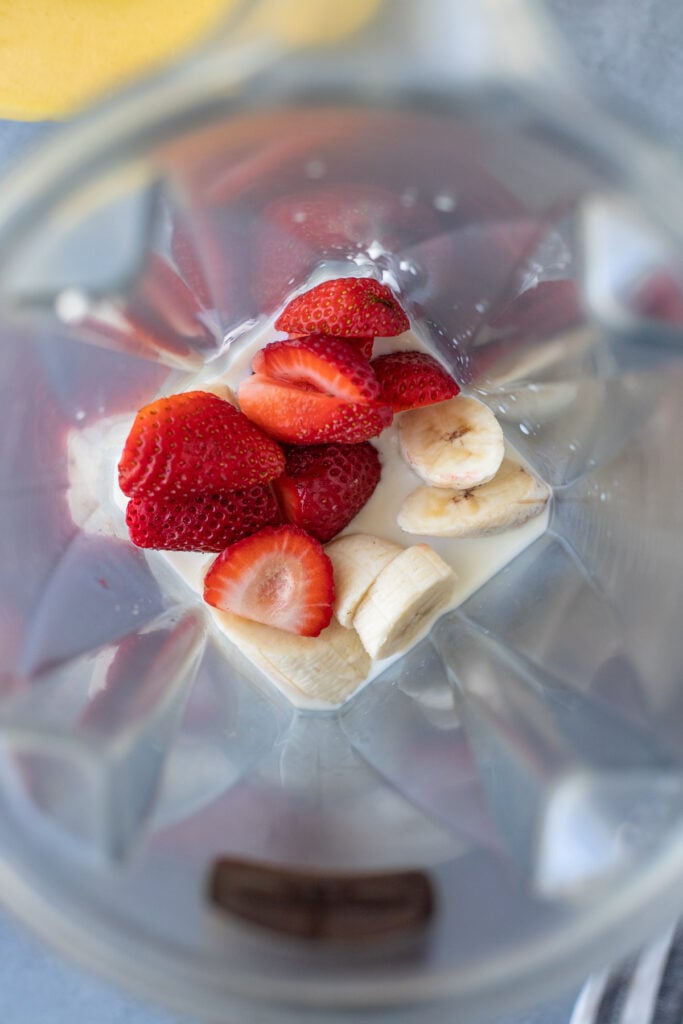 A close up of Strawberry Banana Smoothie before being blended