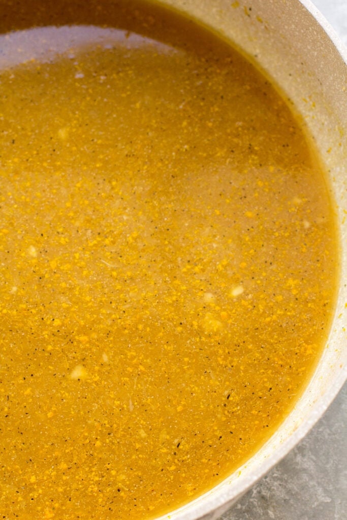 Healthy Orange Chicken Sauce in a pot before it has been boiled