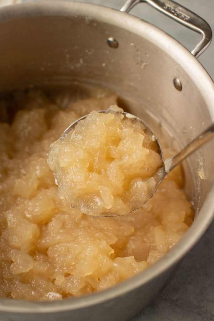Beef Bone Broth in a silver pot that has gelled up