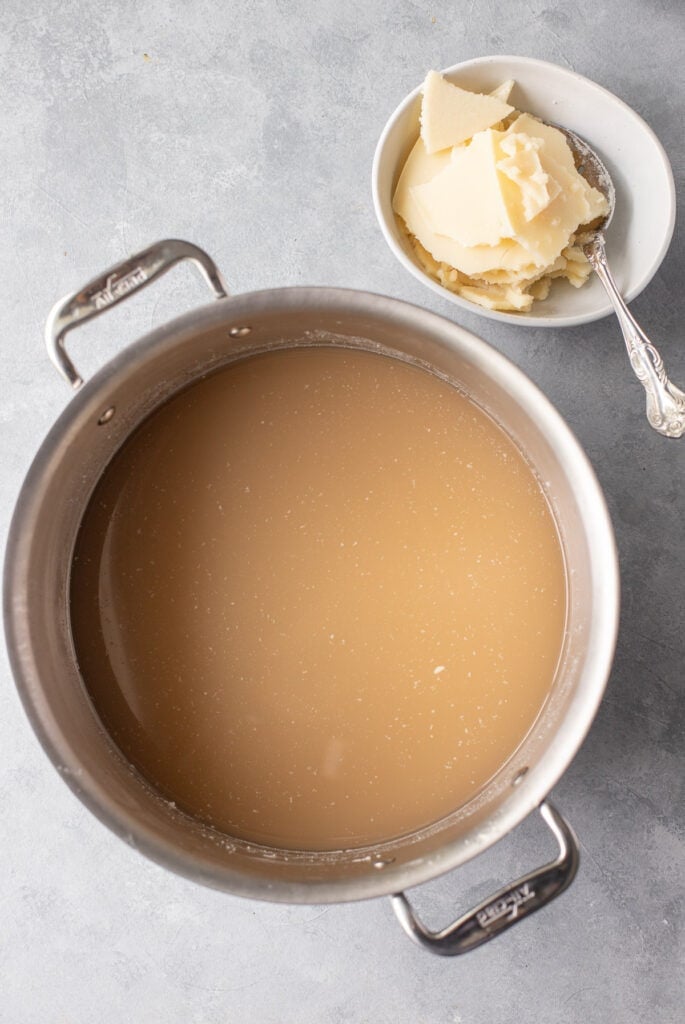 a pot of homemade beef bone broth with the fat scraped off of it.
