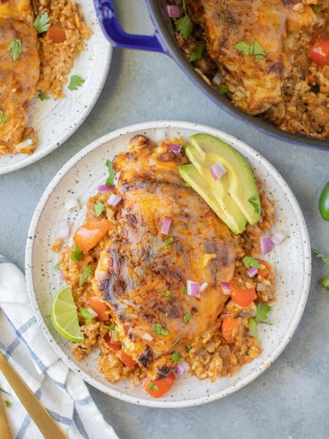 Chicken fajita casserole on a plate next to a blue pot with more of the casserole in it.