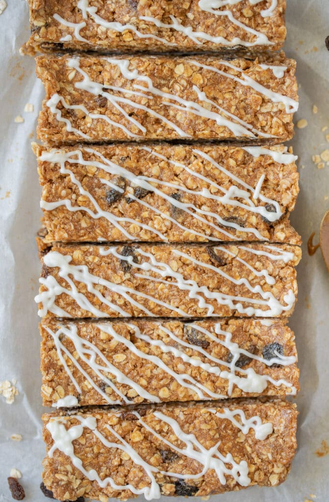 A close up of healthy protein bars on a parchment lined baking sheet