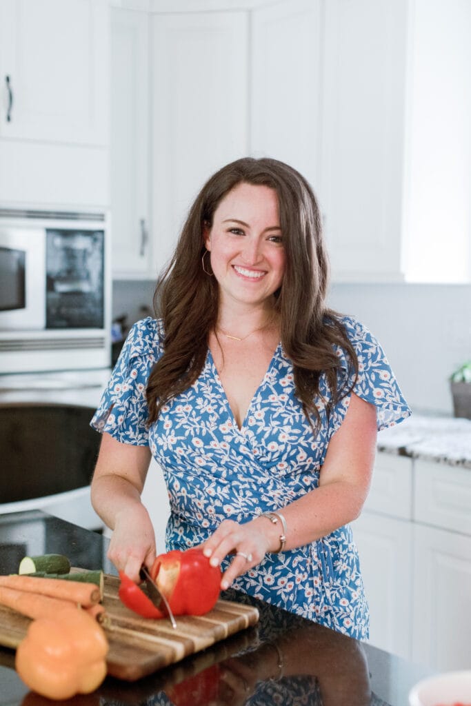 Healthy Meal Prep Idea - a girl cutting a bell pepper
