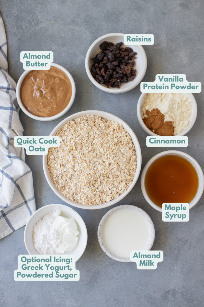 Ingredients for the Best Oatmeal Raisin Bars in small white bowls on a grey background