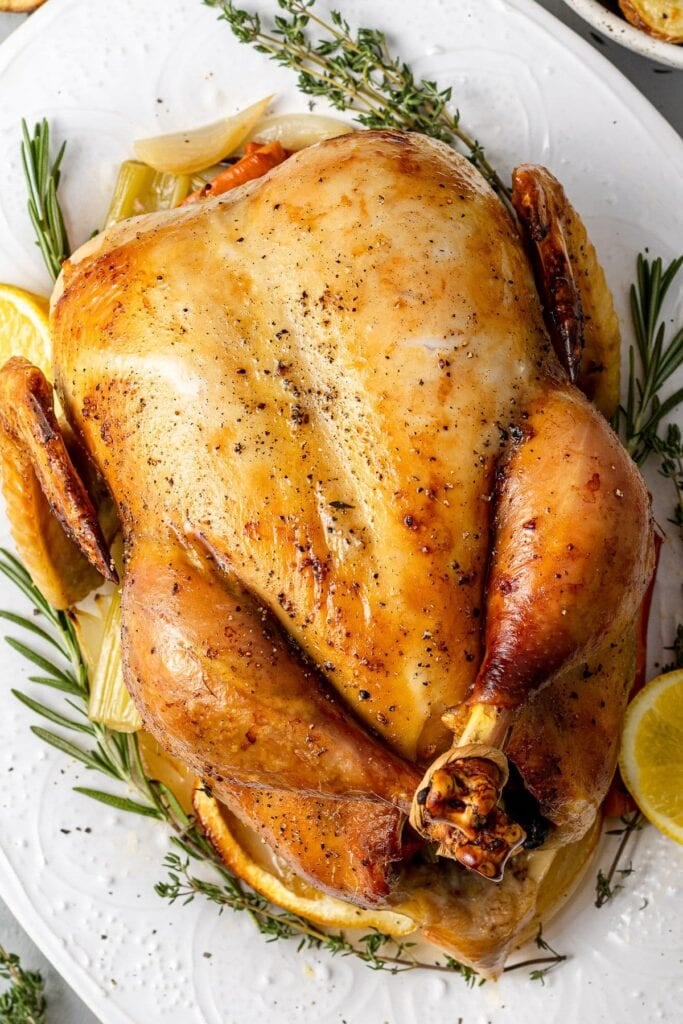 Whole Roasted Chicken on a white platter