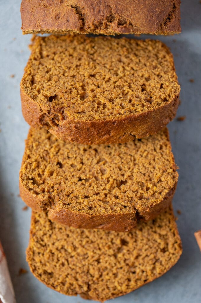 Slices of easy healthy pumpkin bread on a grey background 