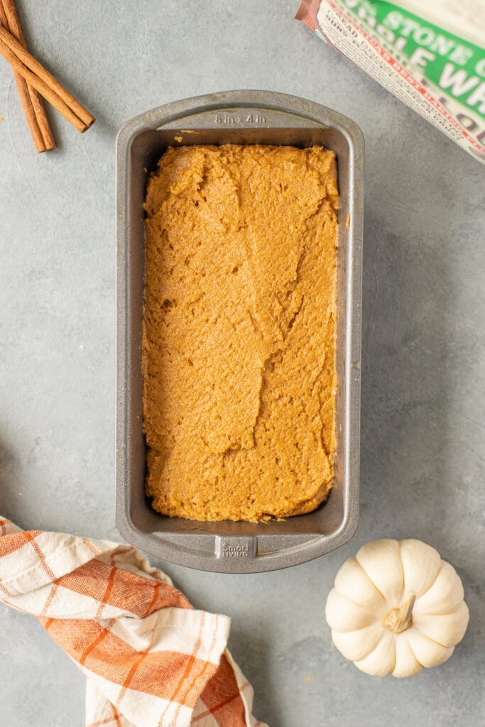 Healthy Pumpkin Bread in a loaf pan before being baked in the oven.