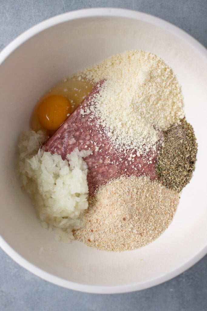 Batter for homemade ground beef meatballs before being mixed together