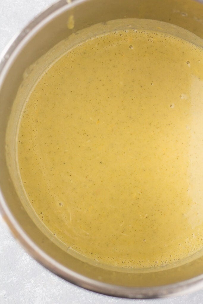 a close up of healthy broccoli soup in a pot