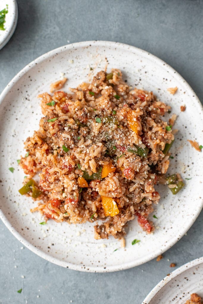 An overhead shot of stuffed pepper casserole (without cheese) on a white plate
