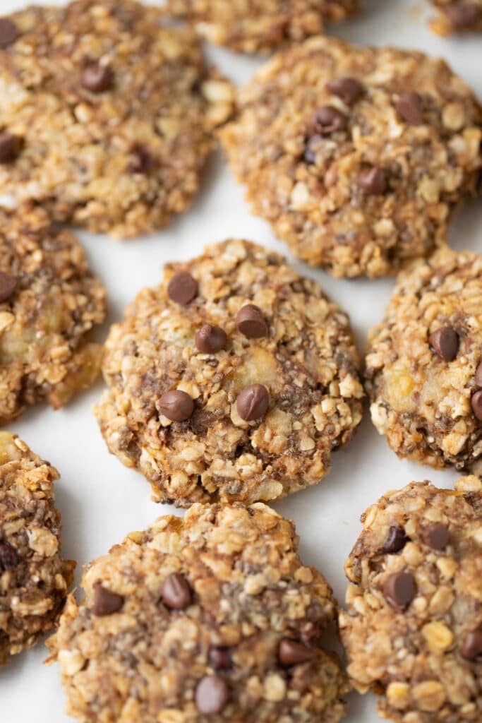 A close up of banana oatmeal cookies with chocolate chips