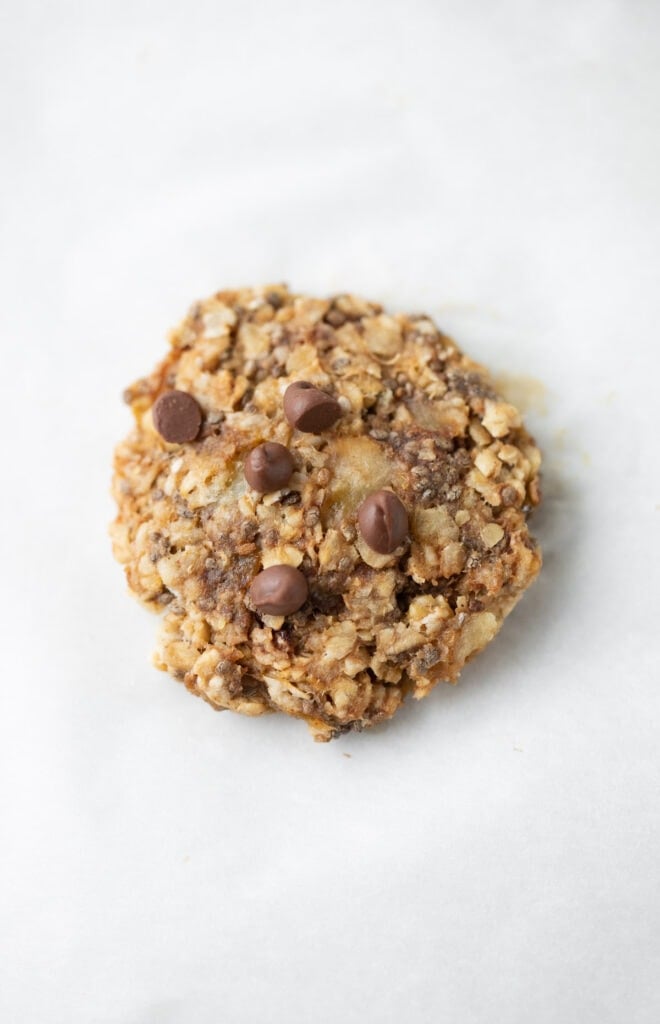 a single healthy banana breakfast cookie on a white background