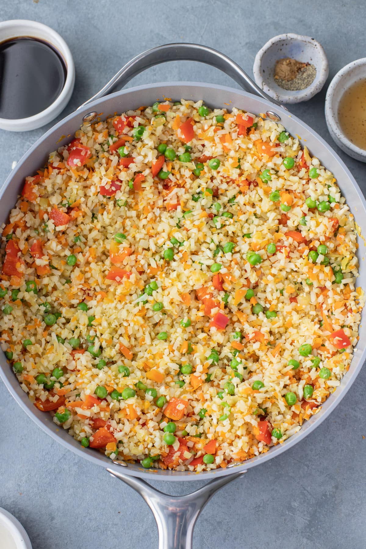 Sautéd veggies in a pan for cauliflower fried rice