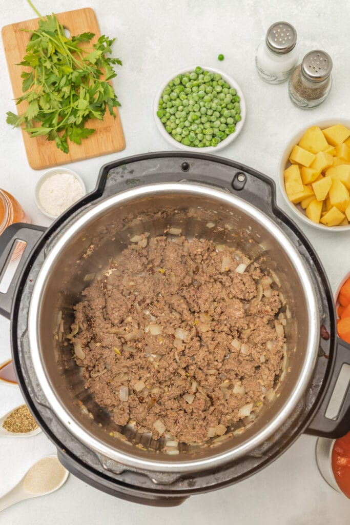 Hamburger Stew being browned in an instant pot