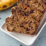 Healthy Banana Bread sliced on a white dish