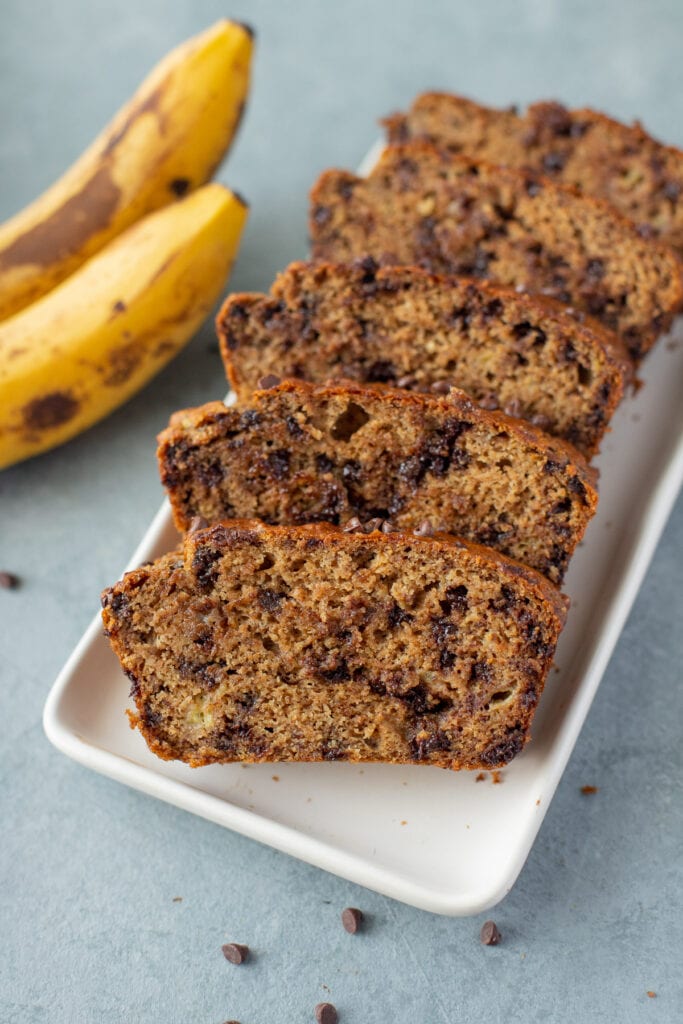 Healthy Banana Bread sliced on a white dish