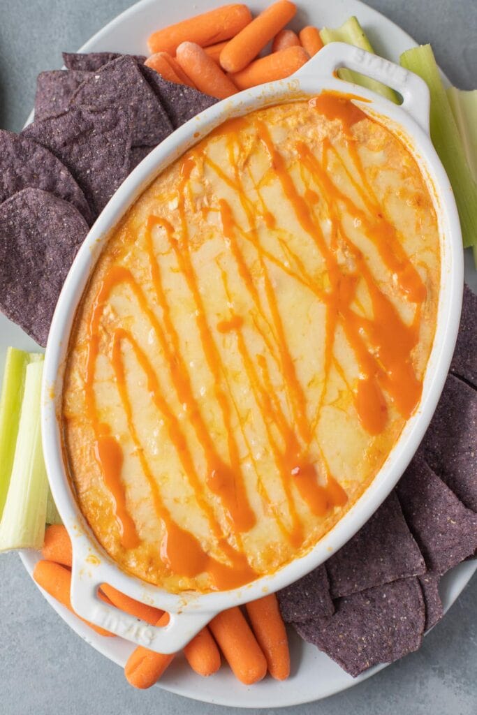 A close up of healthy buffalo chicken dip on a platter for game day