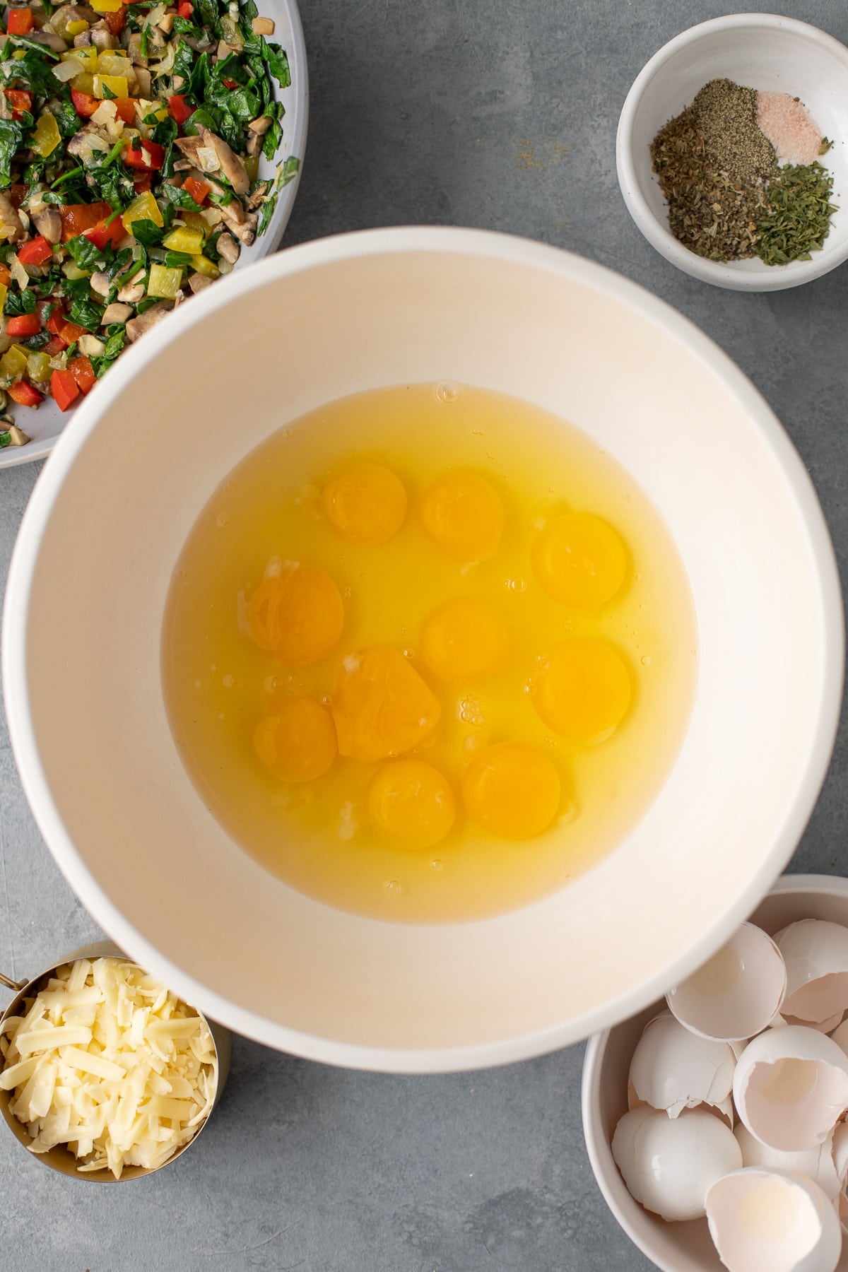 eggs in a large bowl before being beaten into an egg mixture for a healthy egg casserole