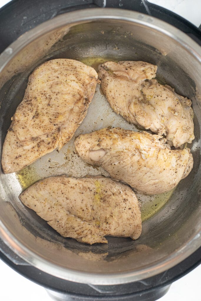 cooked chicken breasts in an instant pot with olive oil for keto chicken parmesan