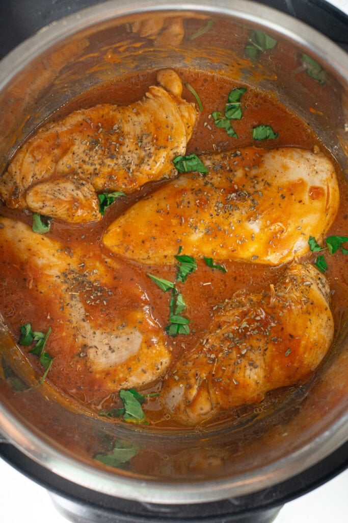 All ingredients (except cheese) in instant pot for keto chicken parmesan