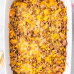 An overhead shot of taco ground beef casserole in a white dish