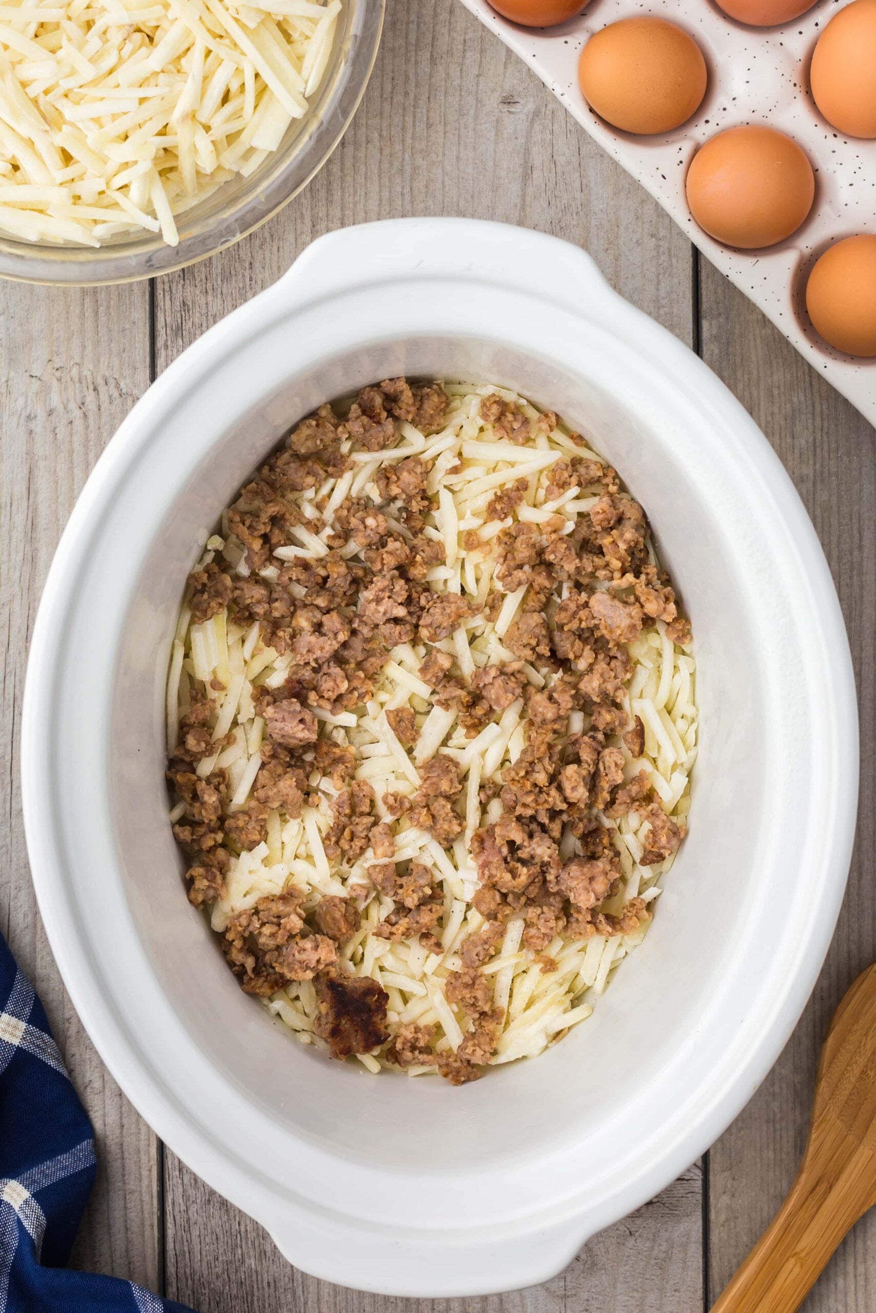 hashbrowns and sausage in a crock pot for crockpot egg casserole