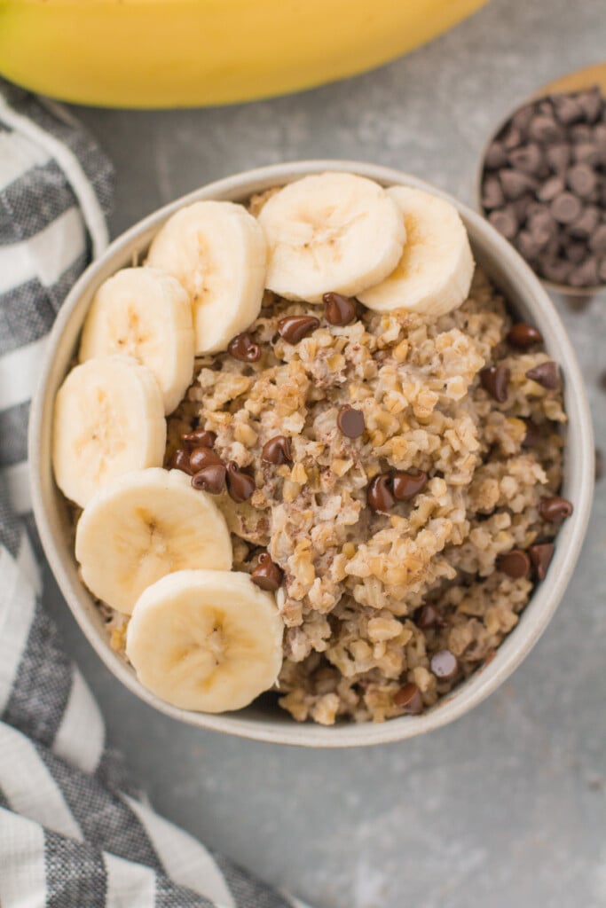 A close up of easy Steel Cut Oats in a small white bow