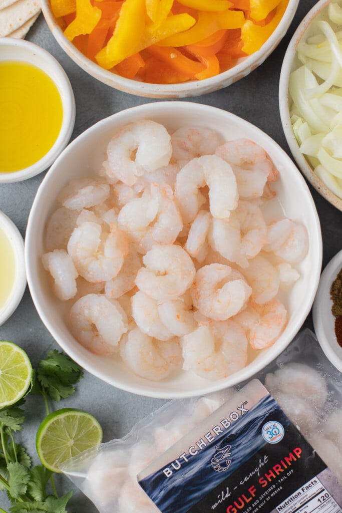 a close up of shrimp in a white bowl