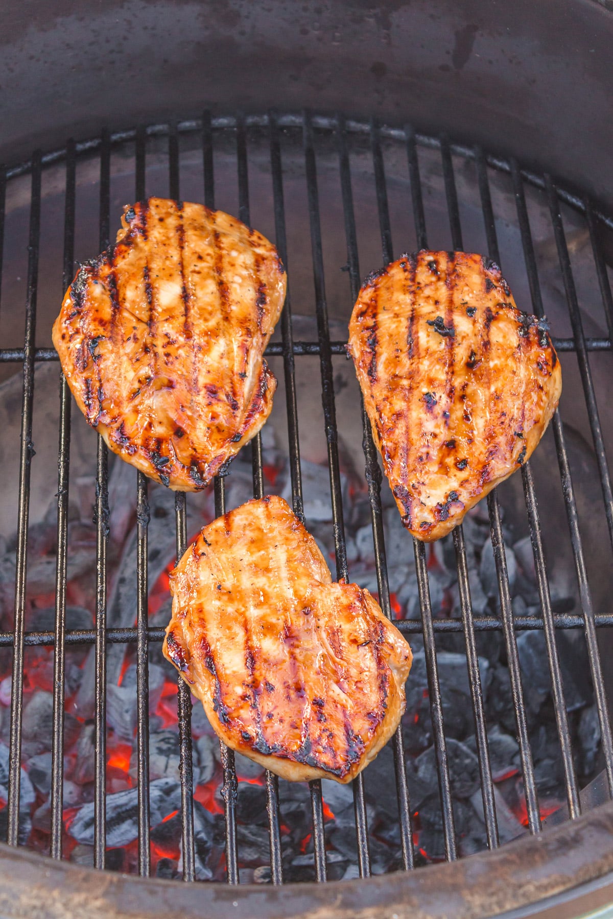 chicken teriyaki grilled on a grill with delicious grill marks