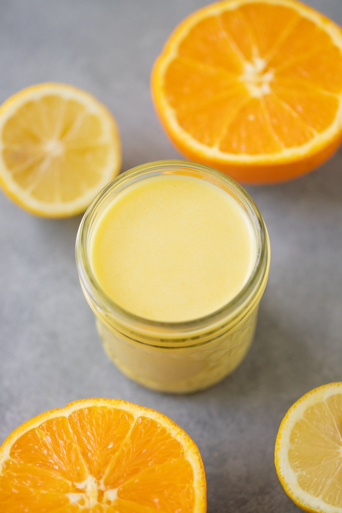 a mason jar of citrus salad dressing