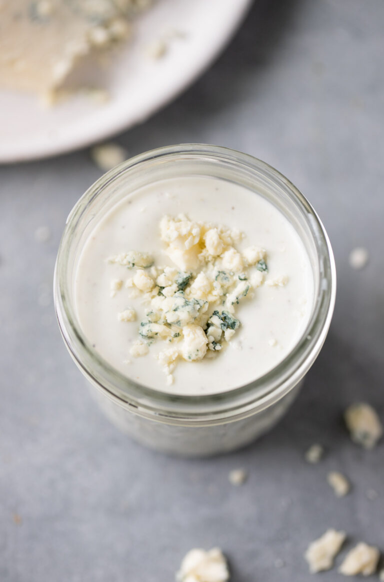 A close up of healthy blue cheese dressing in a glass jar