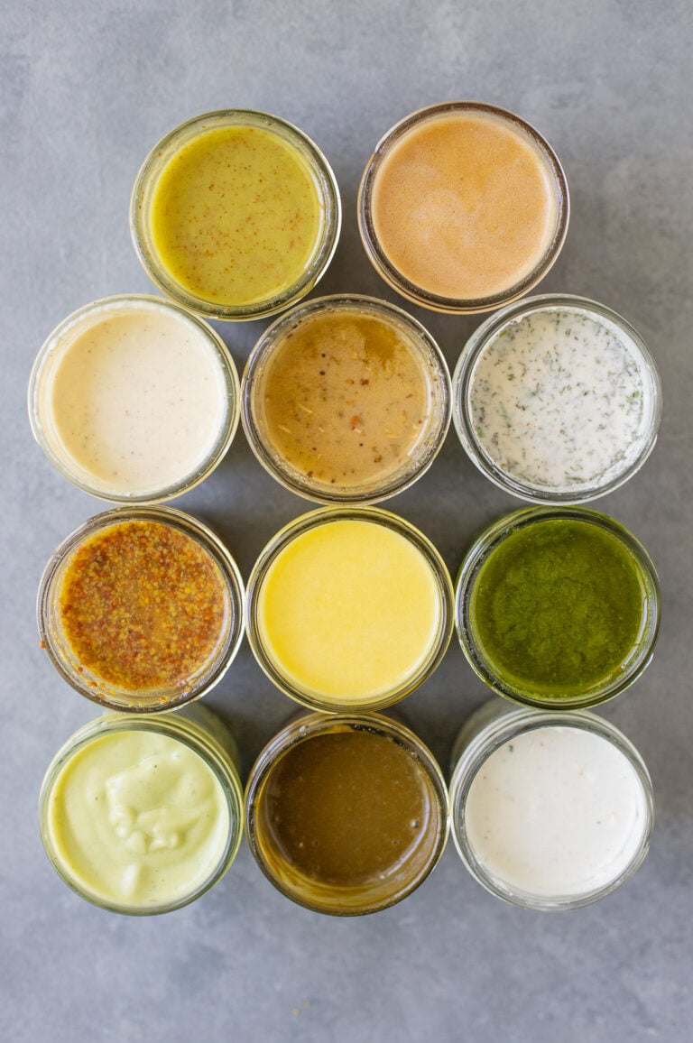 11 Healthy Salad Dressing Recipes in small mason jars