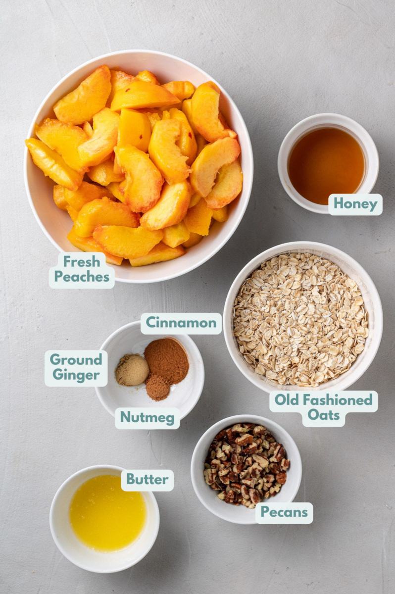 Peach Crisp Ingredients in small white bowls on a grey background