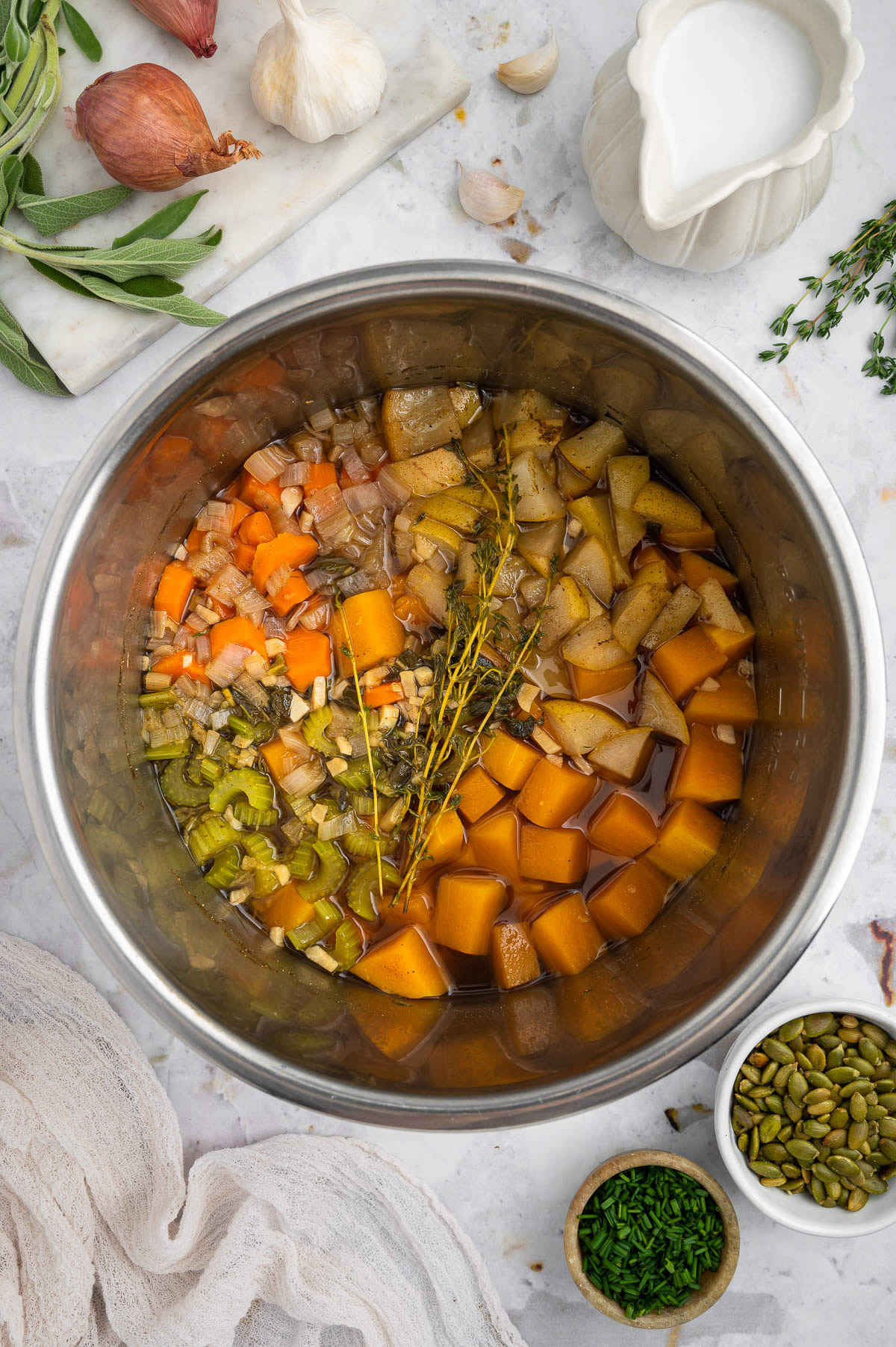 Ingredients for instant pot butternut squash in a pressure cooker after being cooked before blending