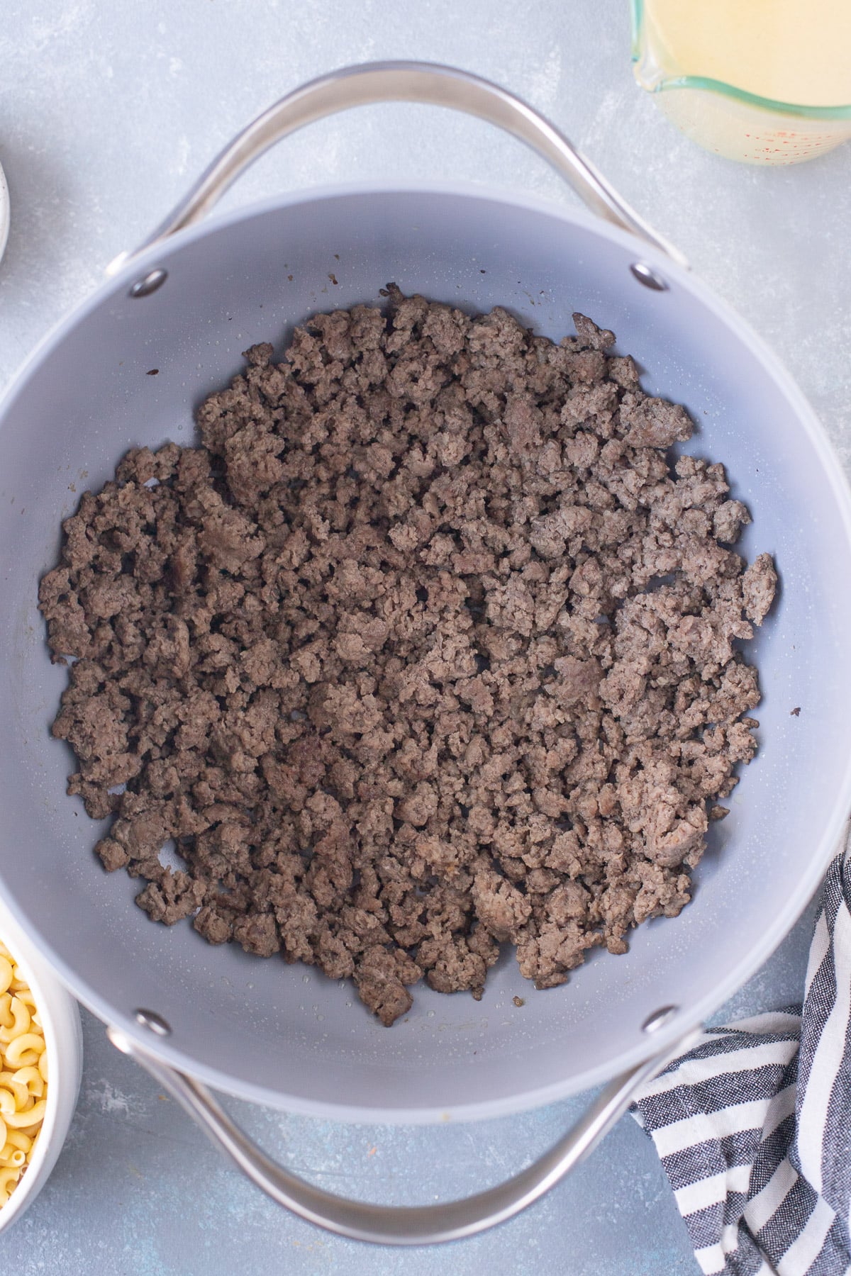 Ground beef after browning in a pot for hamburger vegetable soup