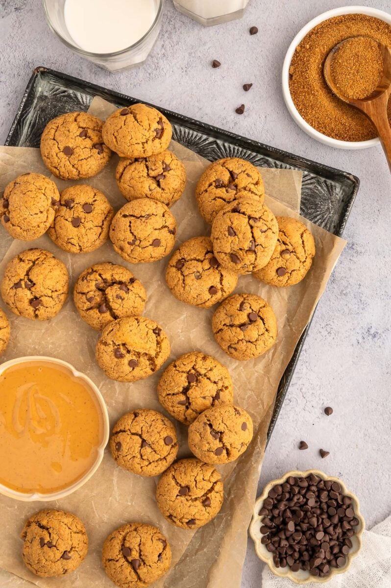 Protein Cookies on a parchment lined baking sheet.