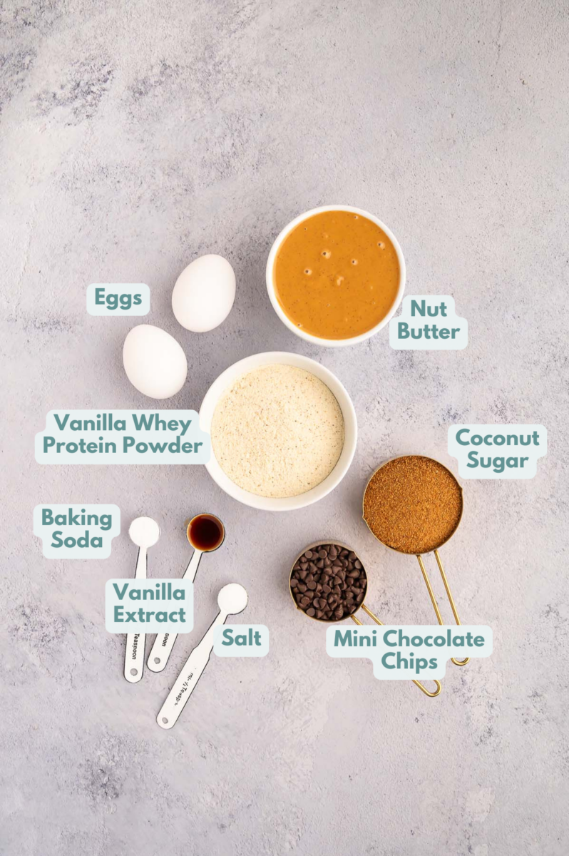 Ingredients for protein cookies in small white bowls