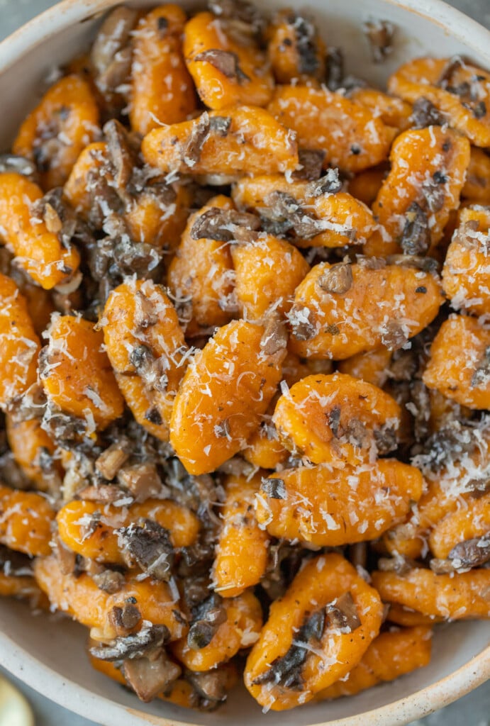 A close up of a bowl of sweet potato gnocchi