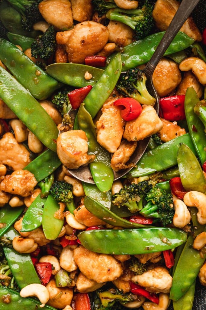 A close up of cashew chicken and veggies