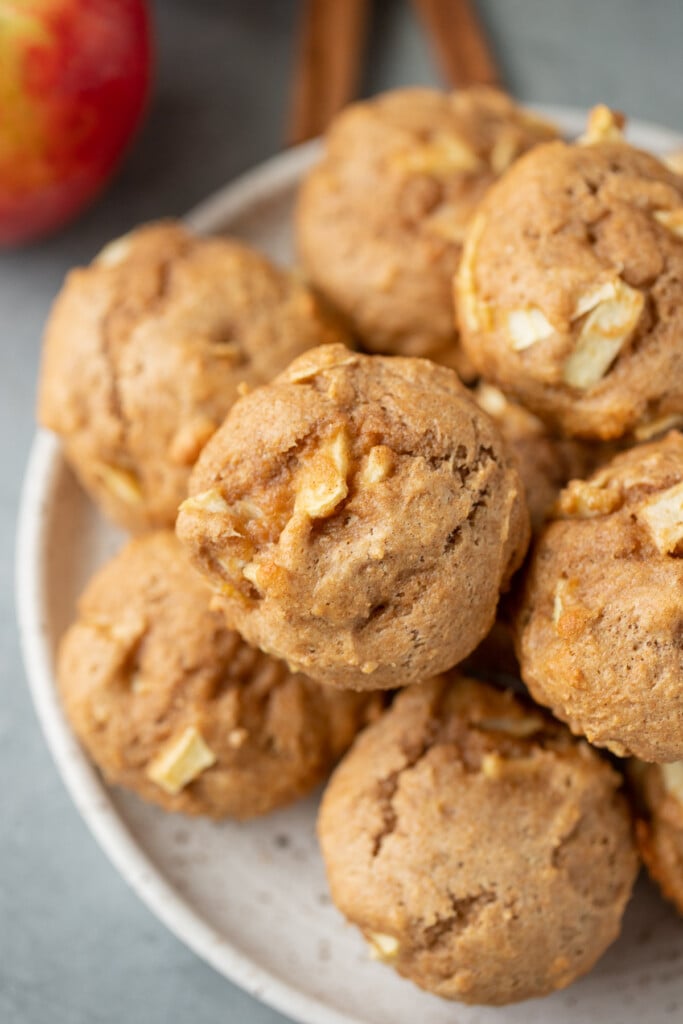 A stack of apple muffins on a plate